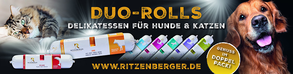 Outdoor-Großformat Werbebanner Ritzenberger Tiernahrung für Hunde und Katzen; Motiv zeigt Hund und Katze auf dunklem Hintergrund, im Zentrum Produkte Tiernahrung, unten Kontaktinfos 